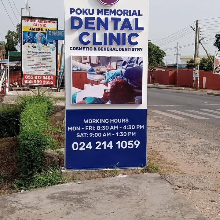 Poku Memorial Dental Clinic signboard showing opening hours