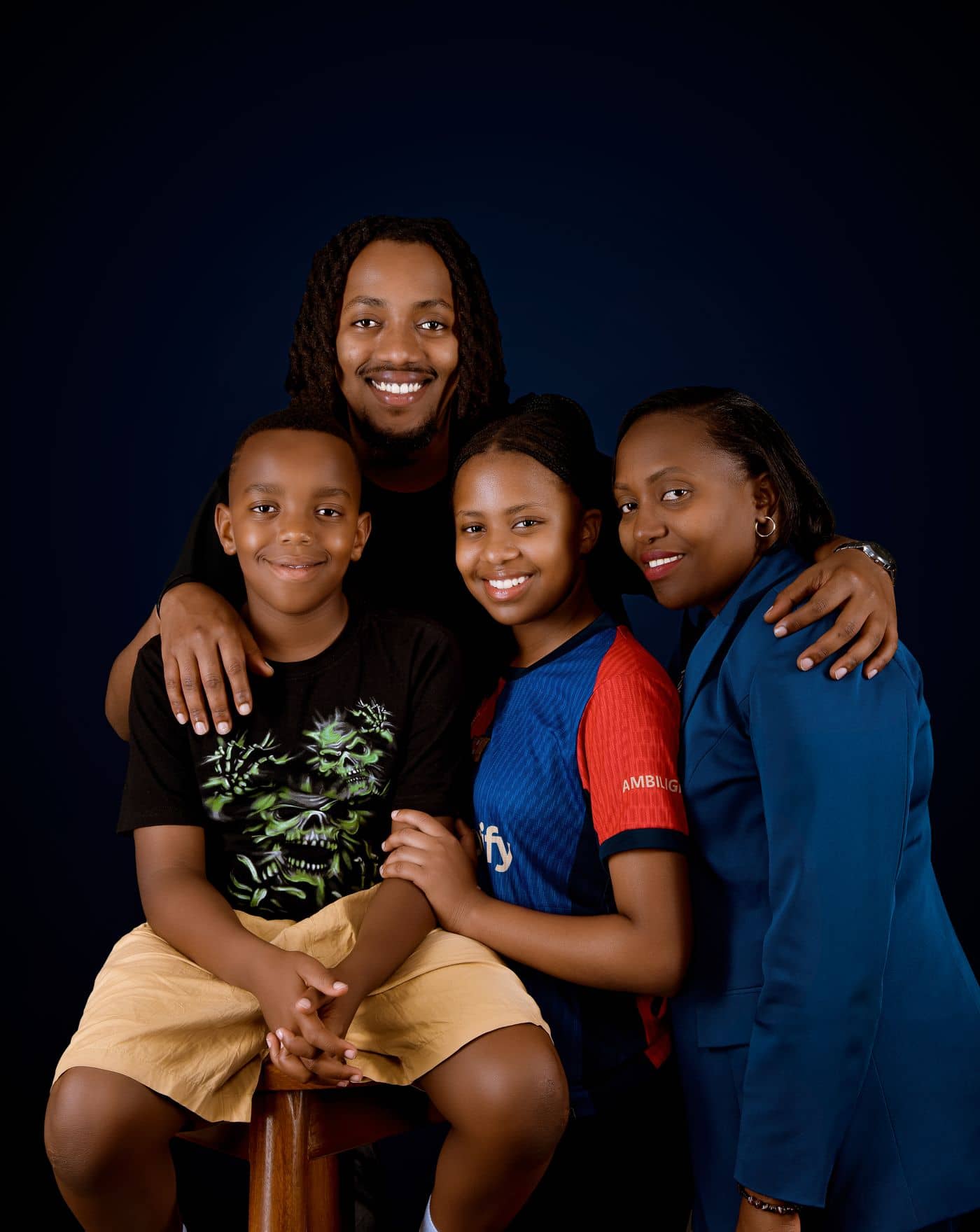 Smiling parents with their two children
