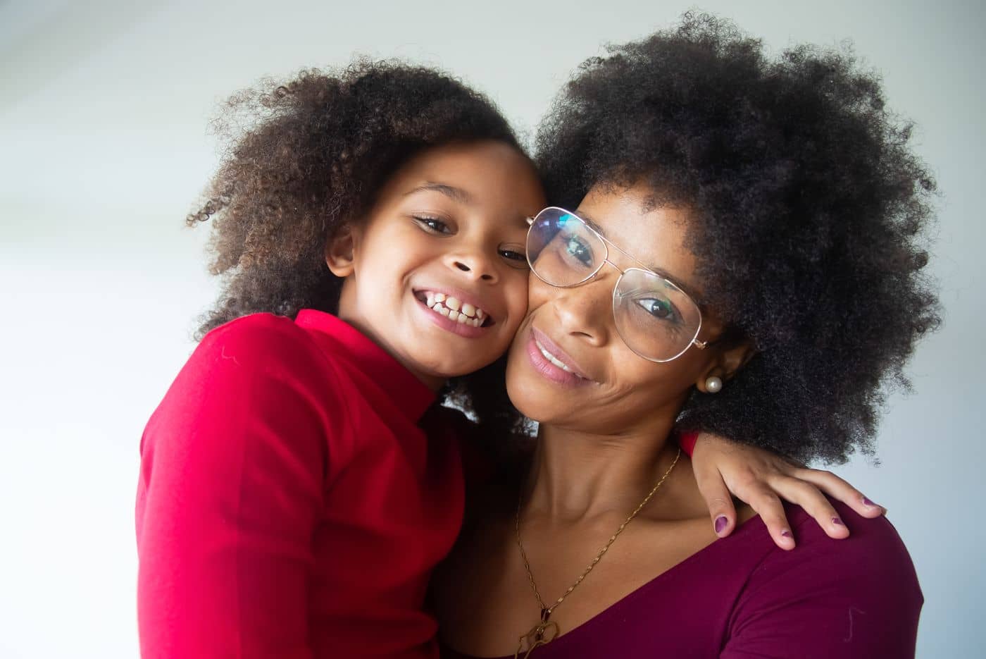 Smiling mother and daughter